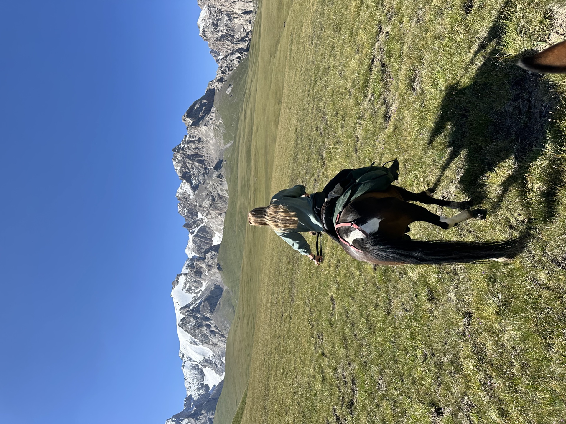 Solo rider with snowy peaks